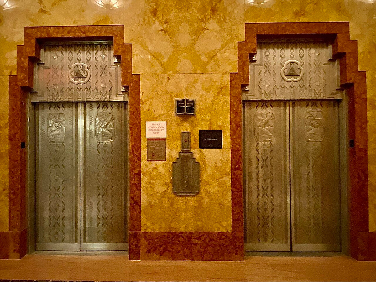 Art Deco elevator entrances in the lobby of 70 Pine Street, New York