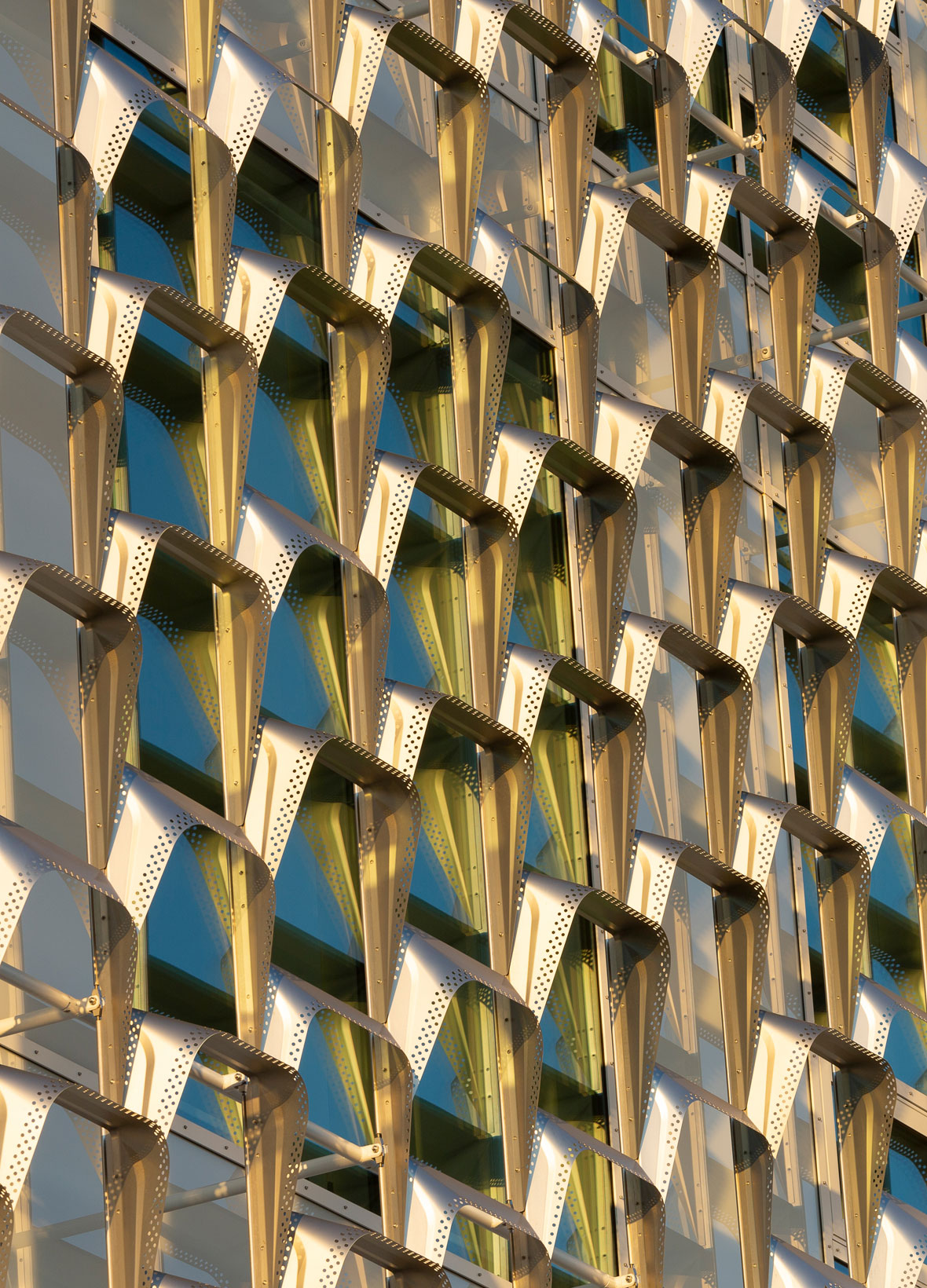 Hydroformed stainless steel shading panels on the Harvard SEC facade
