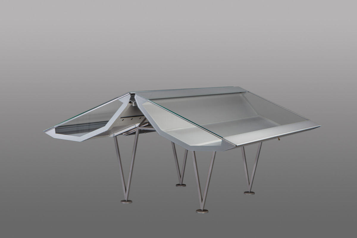 Norman Foster WING museum display case with a dark metal frame and glass lid