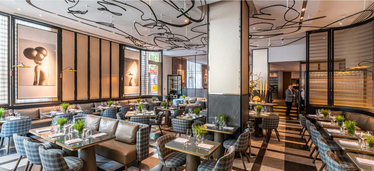Woven metal-mesh room dividers in The Londoner hotel