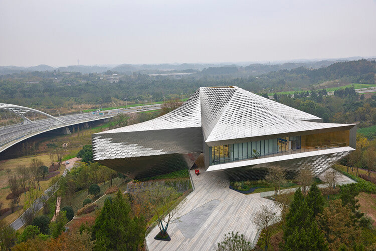 Chengdu Pavilion with a tessellated stainless steel skin and illuminated atrium