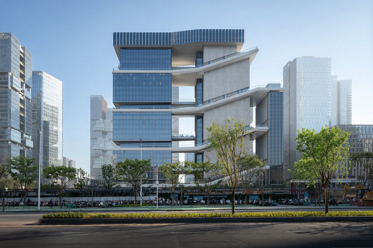 TP-LINK LXD Building in Shenzhen with a white metal facade ribbon