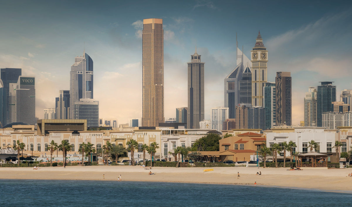 City Tower One in Dubai with a champagne-toned facade and mashrabiya-inspired aluminum screens