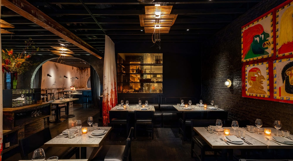 Brass and mesh lighting over the dining room at BADMAASH in Venice, California