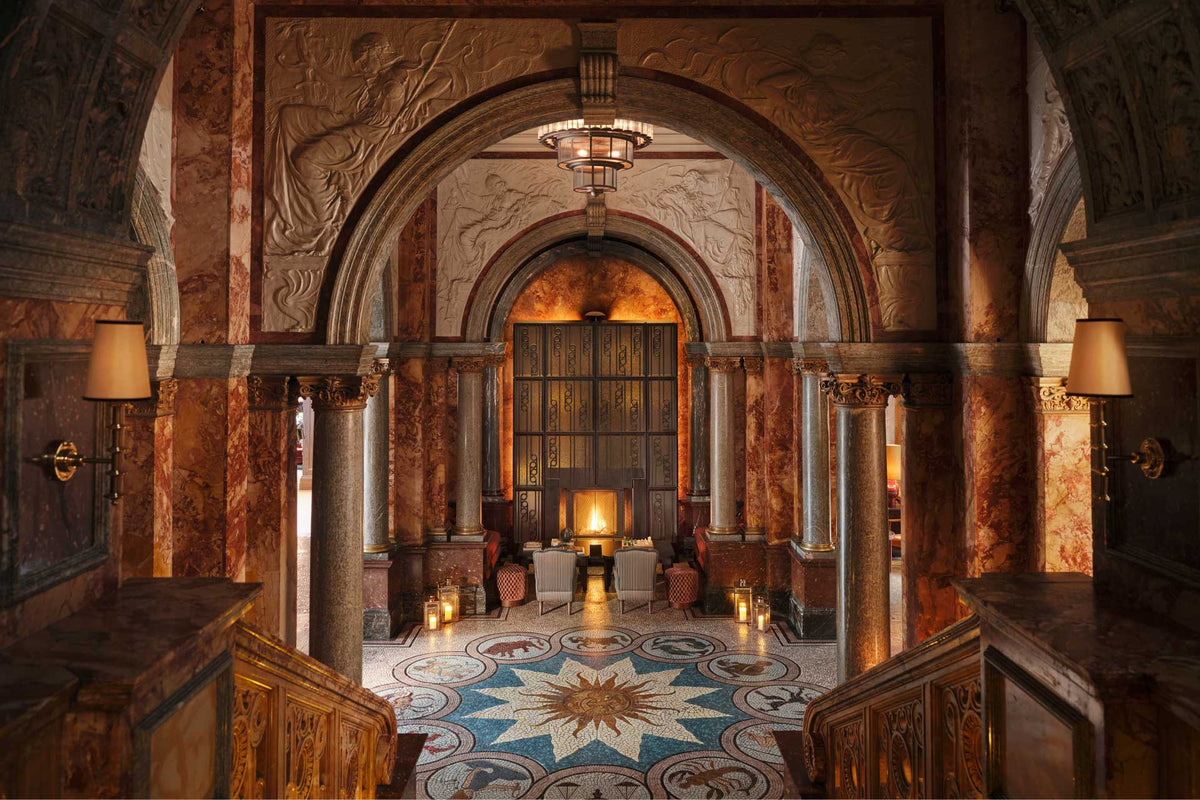 Kimpton Fitzroy London lobby with layered seating and historic interior details