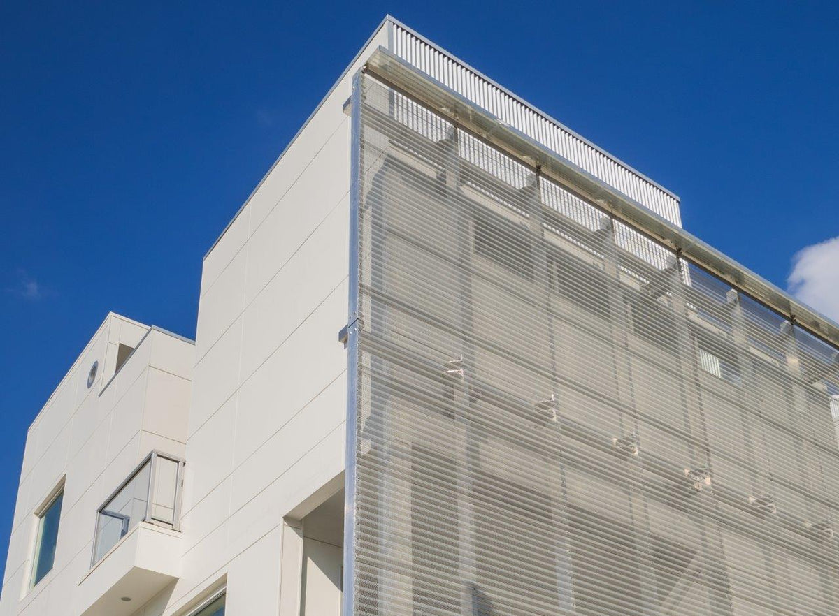 Hendrick perforated corrugated privacy screen at The Art Colony
