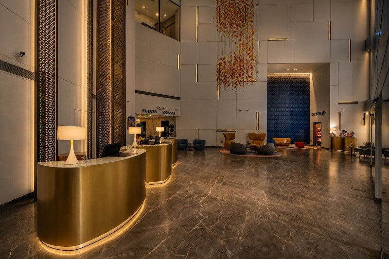 Gold Stainless Steel Reception Desk | Millennium Central Dubai
