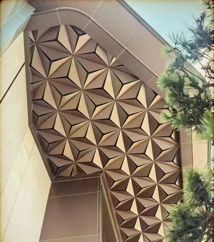 Curved canopy edge with bronze folded metal soffit modules