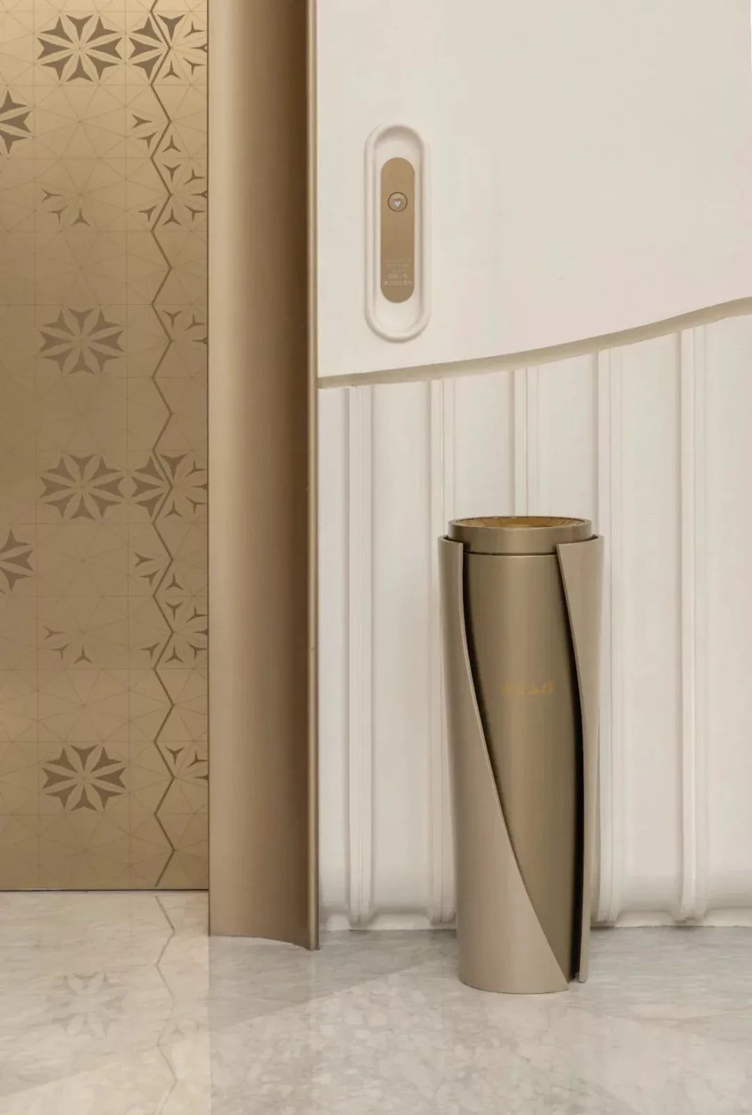 Ornamental brass-tone stainless steel hotel waste bin