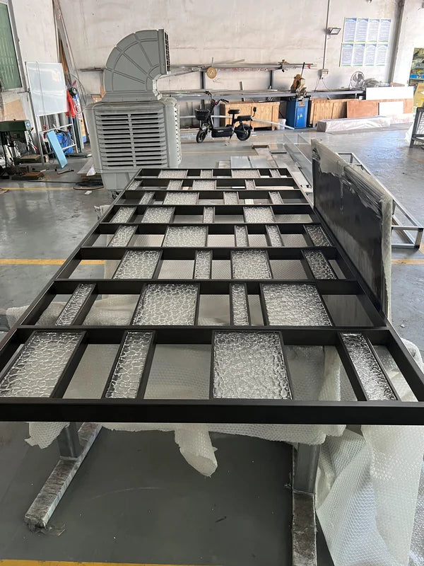 Overall workshop view of black mixed infill steel partition screen