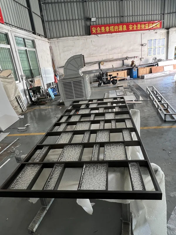 Angled panel view of black mixed infill steel partition screen