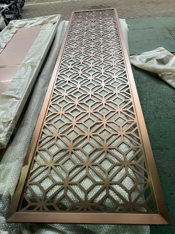 Overall workshop view of bronze asian pattern laser cut steel screen options