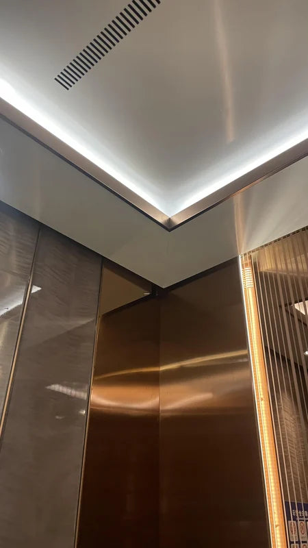 Cabin ceiling and bronze metal wall detail for custom Xinmao Metal elevator design