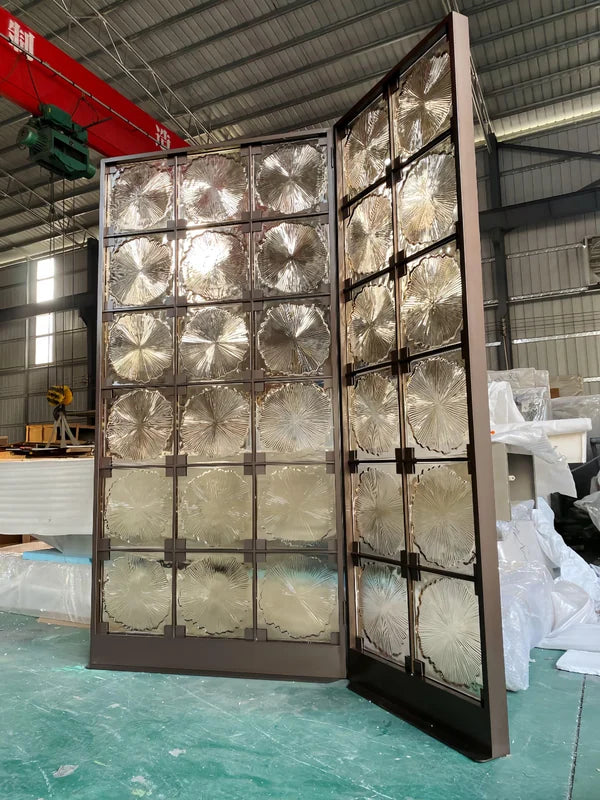 Infill detail of bronze floral textured glass folding screen
