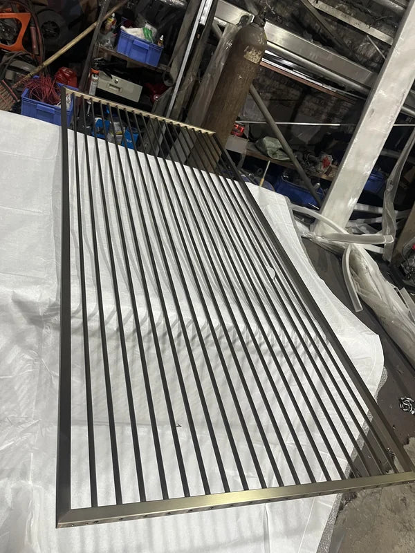 Frame and edge detail of custom architectural grille steel screen panels