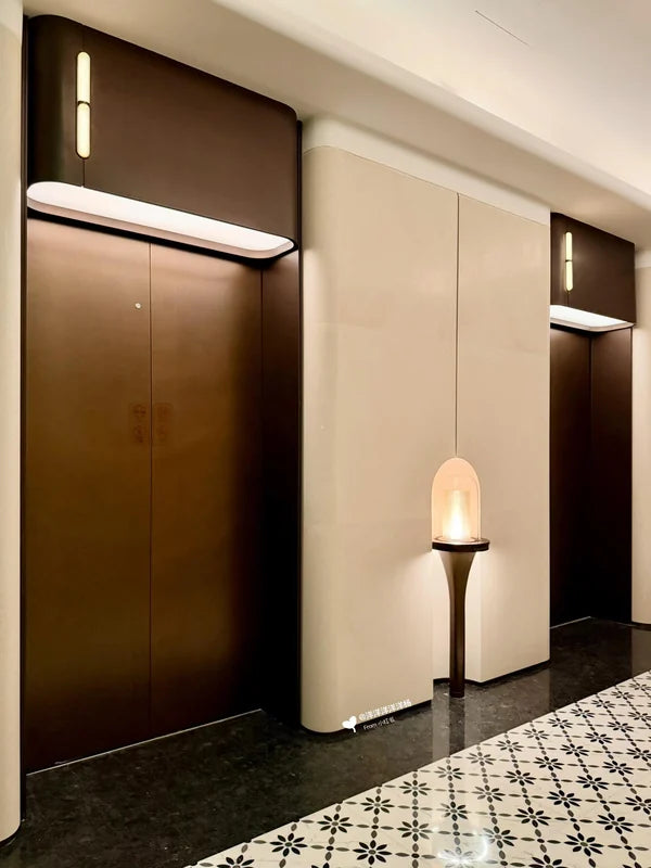 Bronze hotel elevator doors with pale central cladding for custom Xinmao Metal elevator design