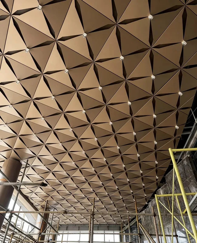 Geometric square aluminum ceiling grid with light points at module junctions