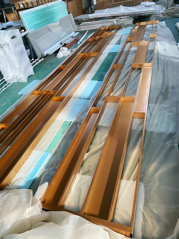 Frame detail of gold linear architectural stainless steel screen frame