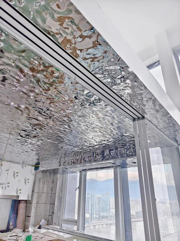 Kitchen water ripple ceiling with long linear service slot
