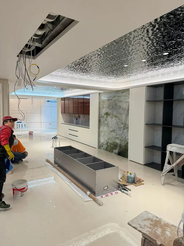 Living area ceiling under construction with service opening