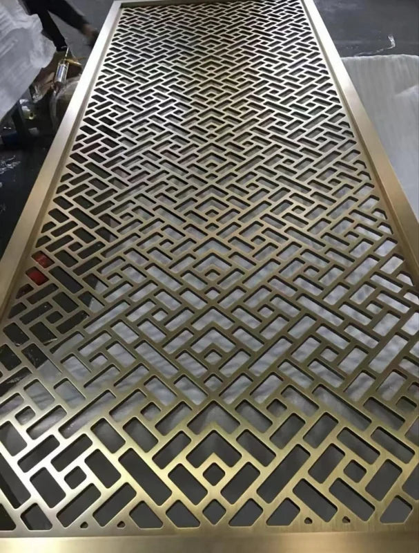 Angled panel view of mixed geometric laser cut steel screen panels