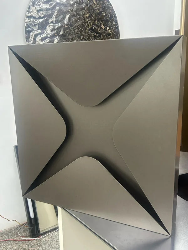 Neutral finish sculpted metal ceiling module sample