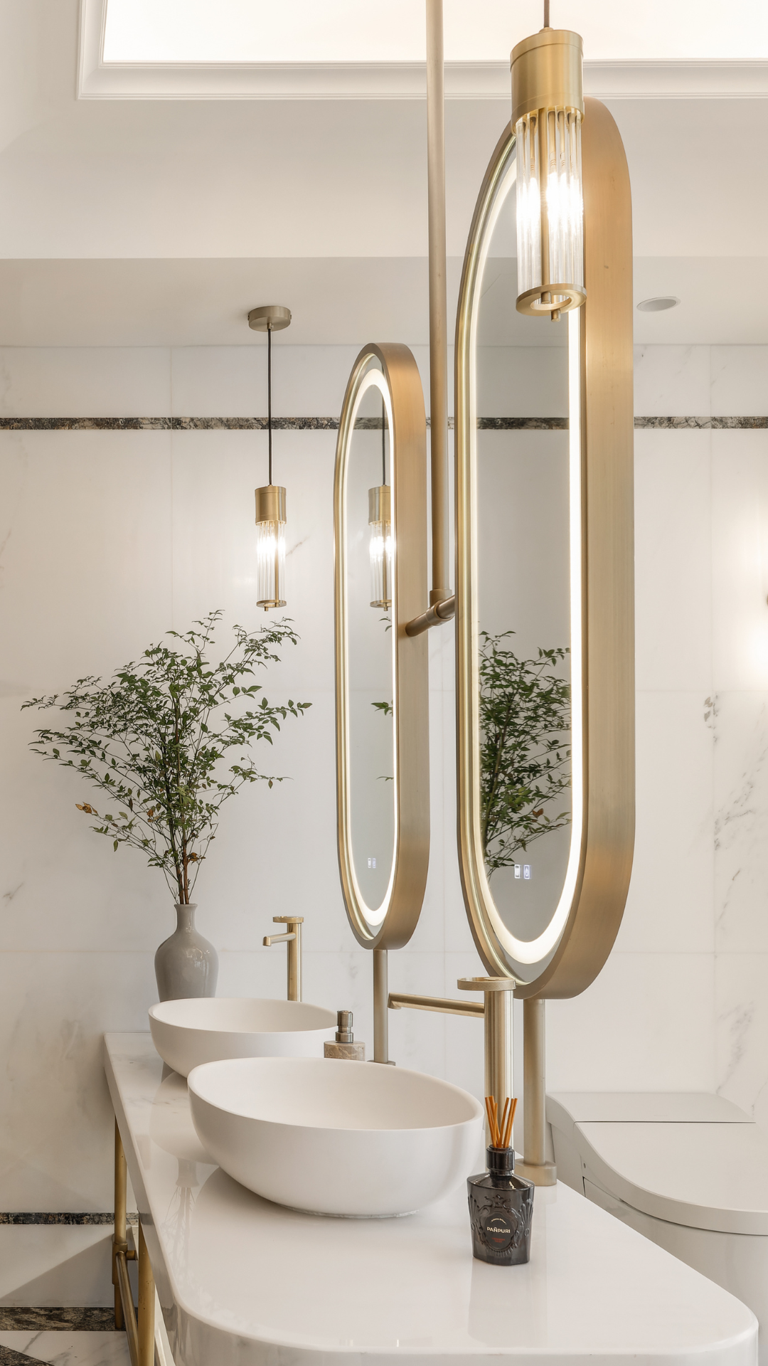 Rounded illuminated mirror cabinet for a wellness vanity area
