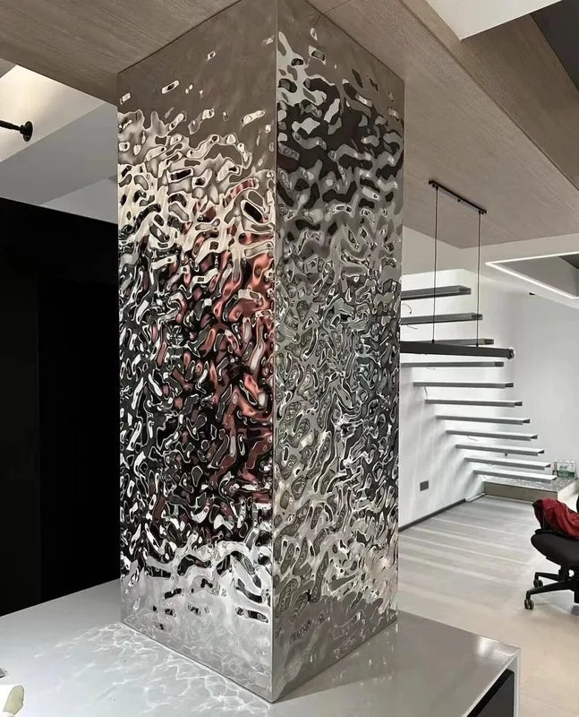 Reflective ripple metal column cladding, non-ceiling reference