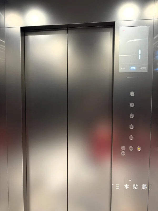 Satin champagne cabin door and control panel for custom Xinmao Metal elevator design