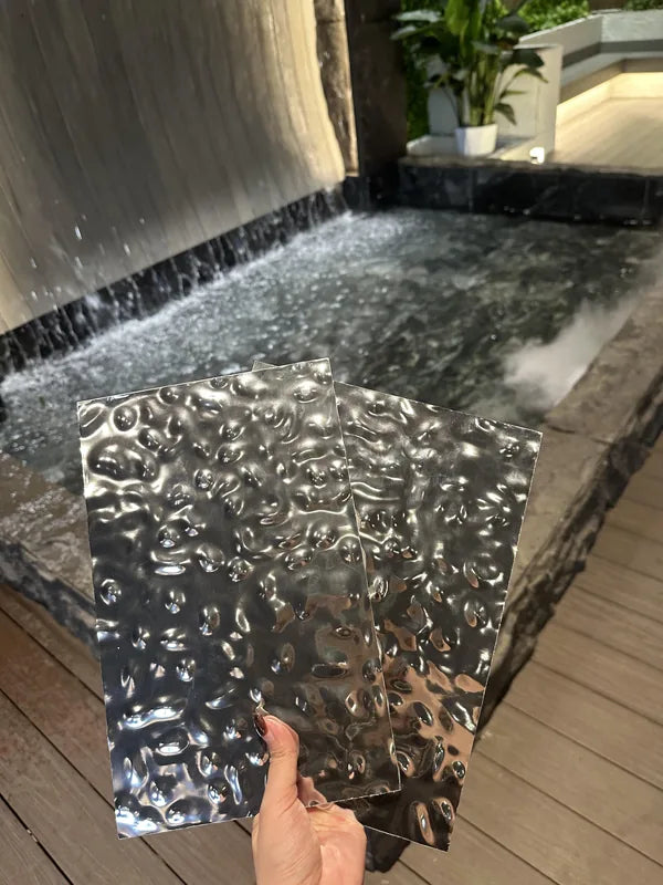 Small handheld water ripple metal finish sample