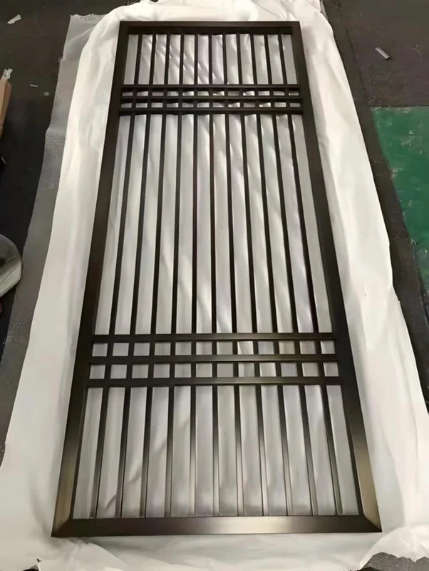 Close detail of Black Vertical Slat stainless steel Screen With Art Panel