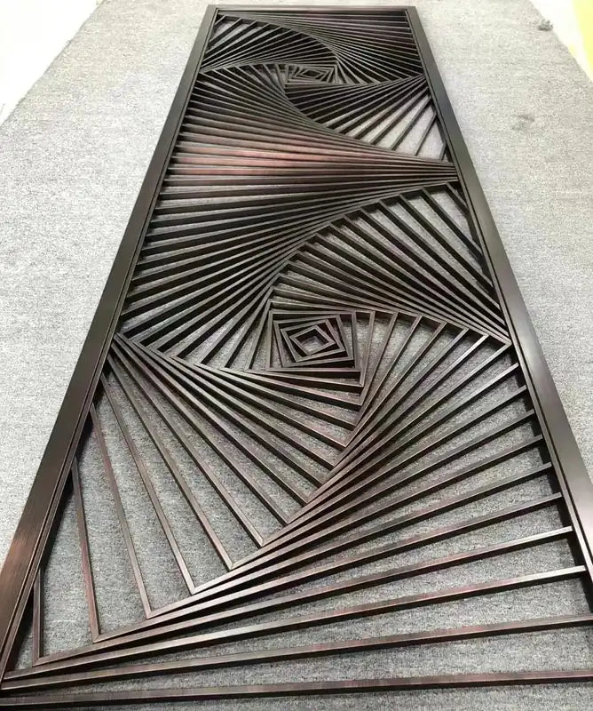 Angled view of Sculptural Art Deco stainless steel Screen Panel