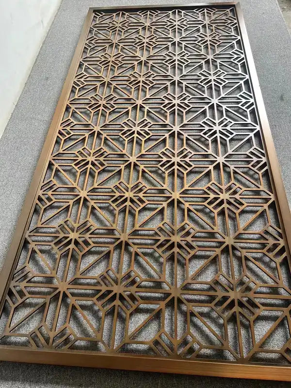 Angled view of Bronze Fan and Hexagon stainless steel Screen Set