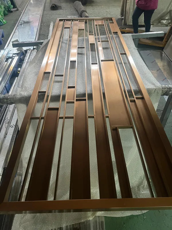 Fabrication detail of Bronze Glass and Metal stainless steel Screen