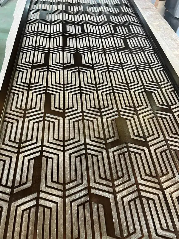 Framed panel view of Bronze Geometric Cutout stainless steel Screen