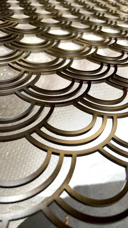 Close detail of Black Cross Motif Laser Cut stainless steel Screen