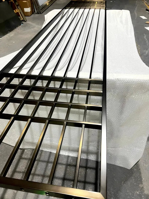 Framed panel view of Black Vertical Slat stainless steel Room Divider