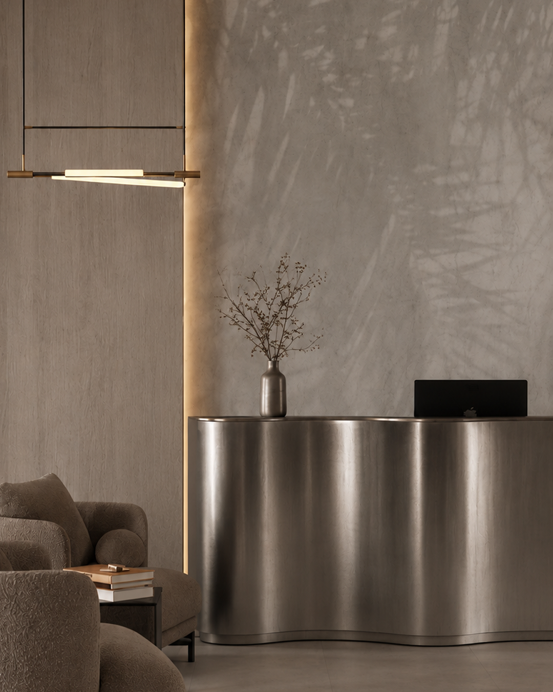 Curved bronze-tone stainless steel reception desk for hotel, clinic and executive office lobbies
