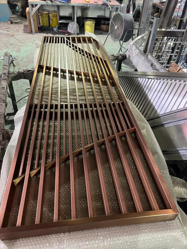 Overall view of Bronze Slatted Textured Glass stainless steel Screen