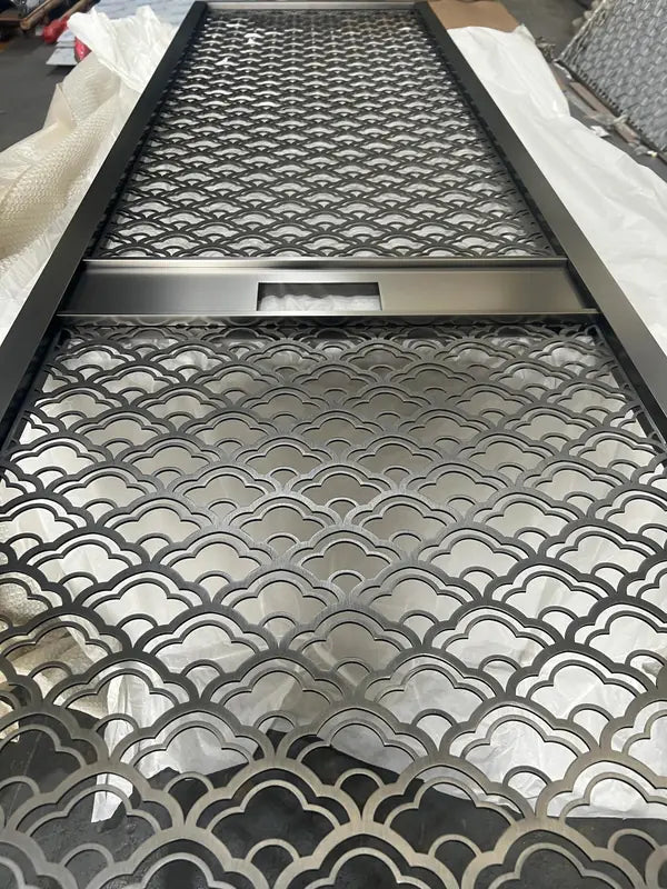 Angled view of Silver Scallop Laser Cut stainless steel Screen