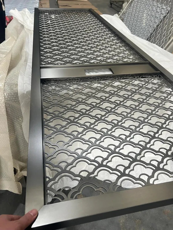Close detail of Silver Scallop Laser Cut stainless steel Screen