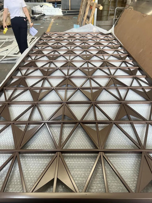 Close detail of Bronze Feature Infill stainless steel Screen options