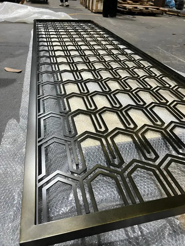 Angled view of Bronze Elongated Hexagon stainless steel Screen
