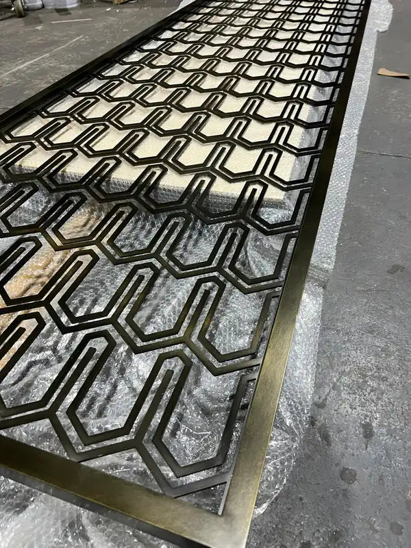 Close detail of Bronze Elongated Hexagon stainless steel Screen