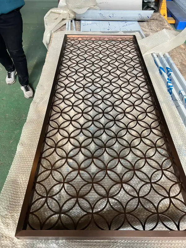 Close detail of Bronze Circular Star Lattice stainless steel Screen