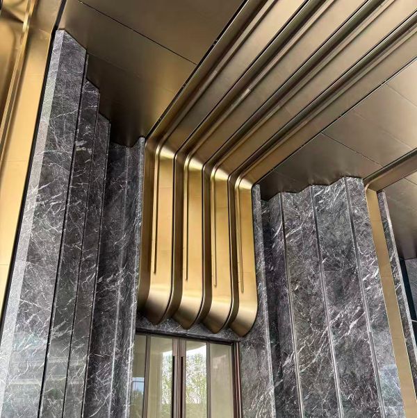 Bronze-tone metal facade on a commercial building