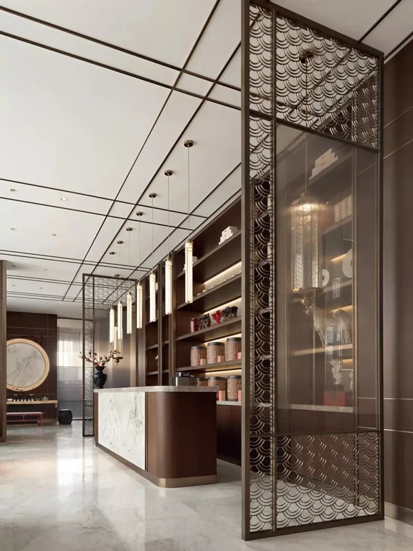 Bronze decorative mesh screen partition in a restaurant interior