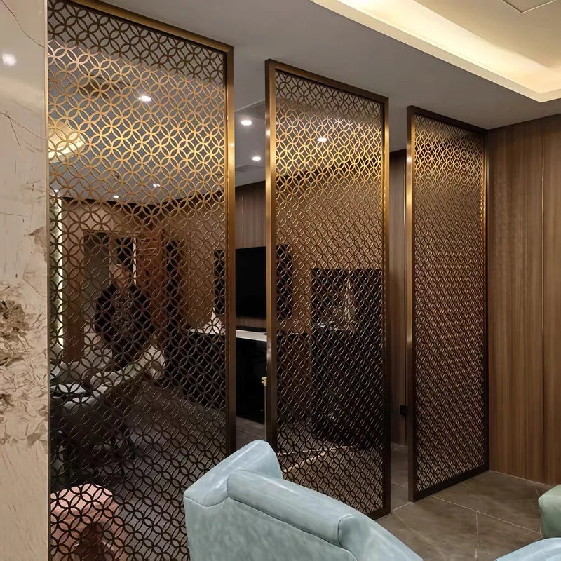 Bronze stainless steel geometric lattice partitions in a lounge interior
