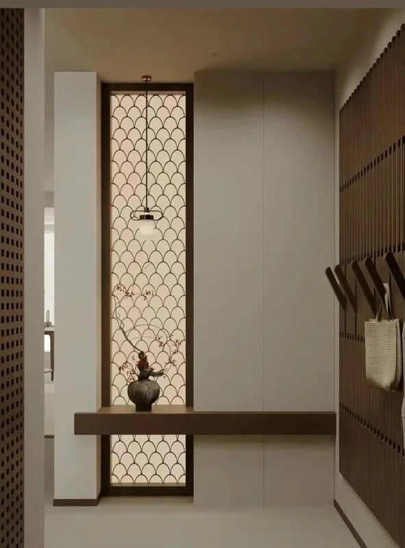 Chinese-style stainless steel lattice screen in a residential entry