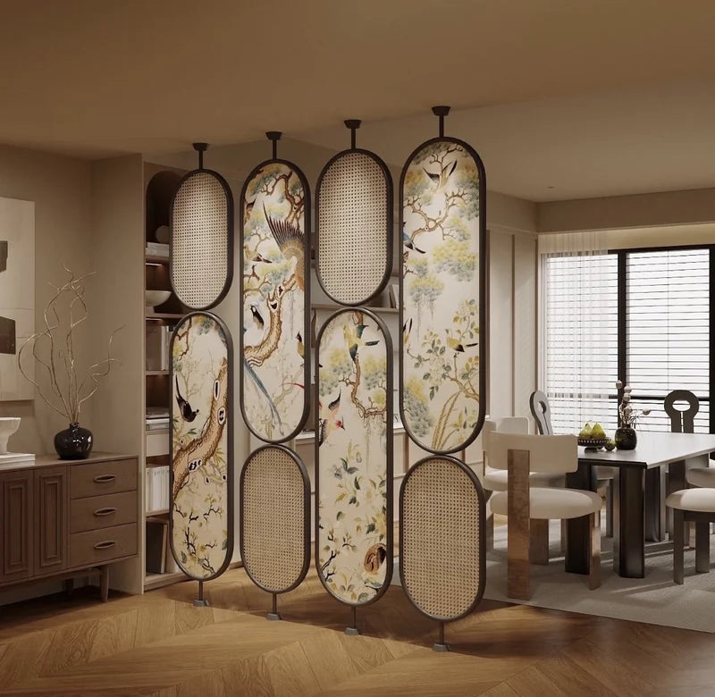 Decorative stainless steel screen with painted panels between dining and living areas